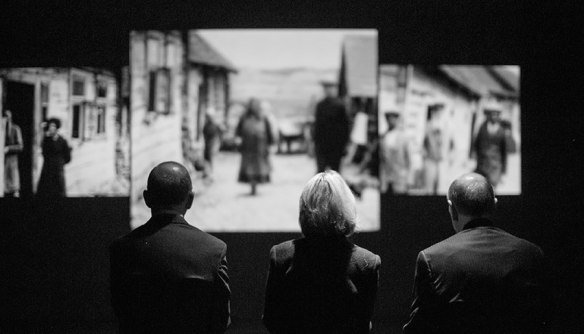 a Forgacs triptych with 3 viewers